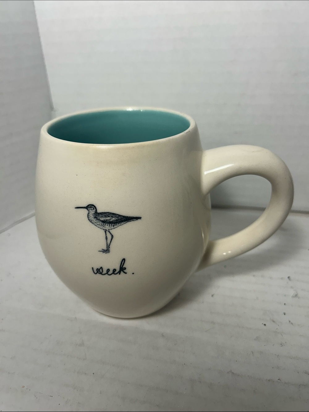 Rae Dunn Cream Mug with Teal Interior and Shorebird Sketch